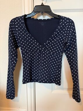 Brandy Melville Zelly atop